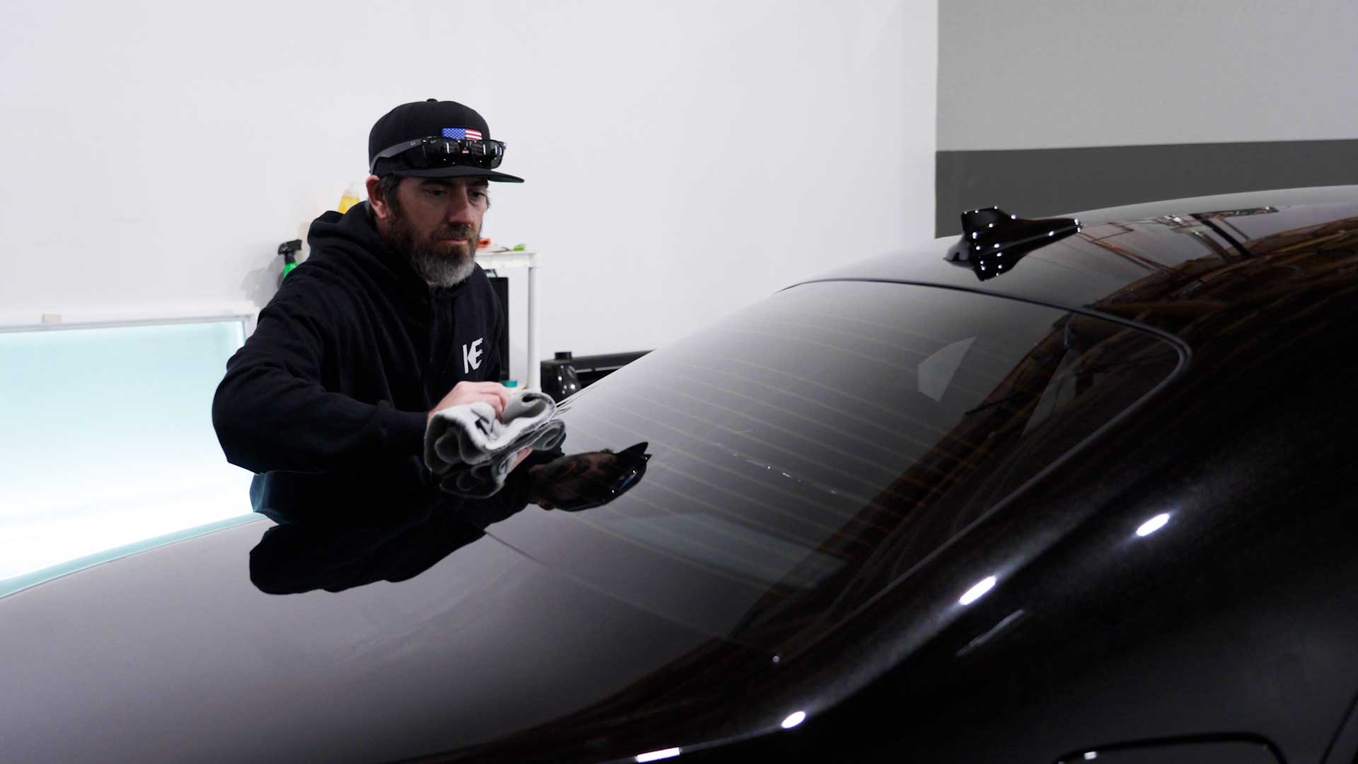 Professional Vehicle Glass Tinting being cleaned after tinting in North Westchester