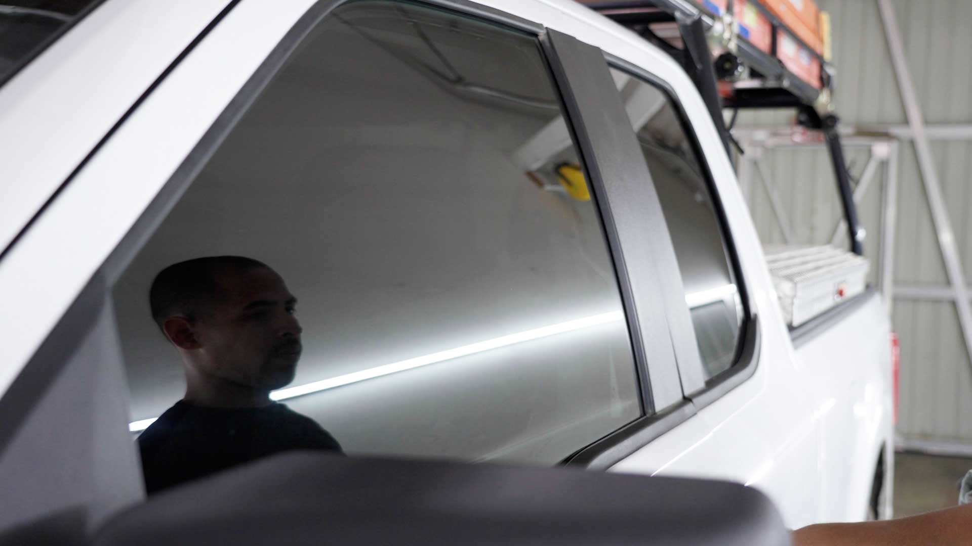 Professional Car Window Tint being cleaned after tinting in Clarksville