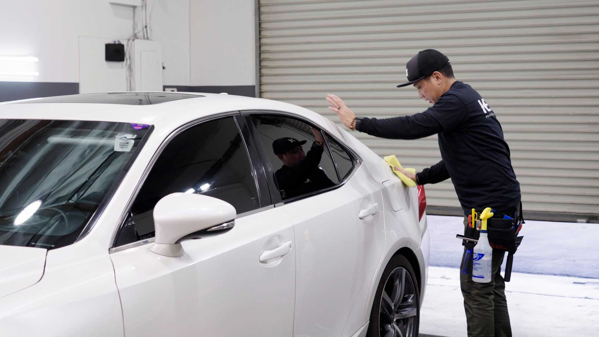 Expert Automotive Window Tint being cleaned after tinting in Algonquin