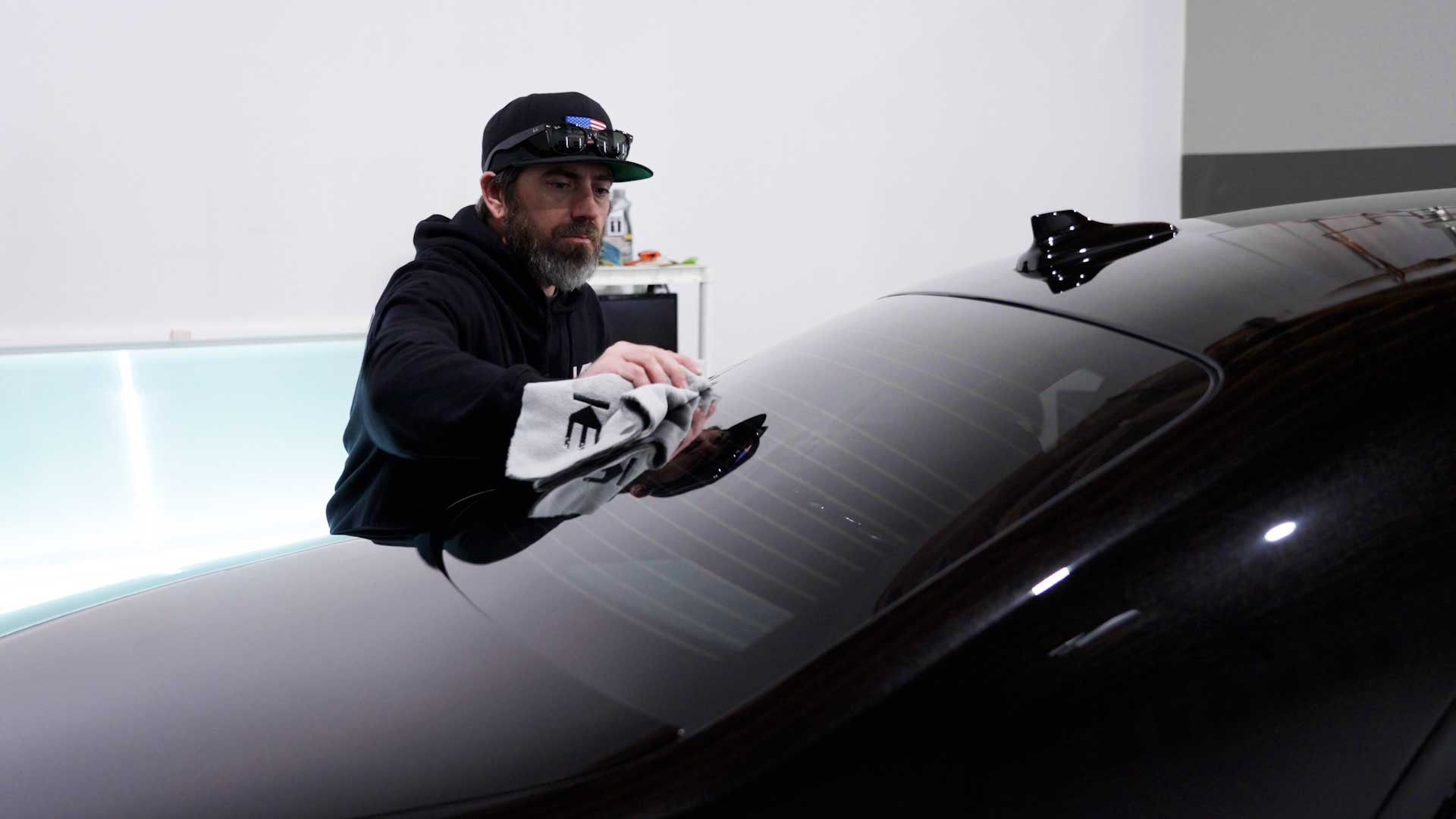 Skilled Car Glass Tint being cleaned after tinting in Lawrence