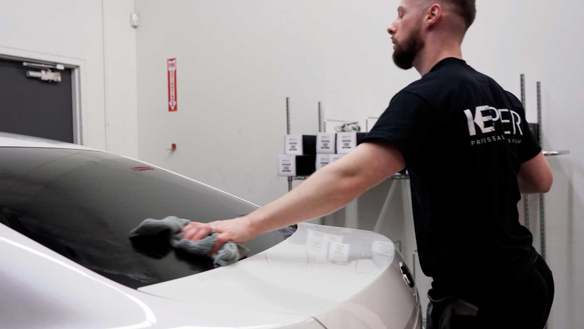 Professional Vehicle Window Tint being cleaned after tinting in Yorkville
