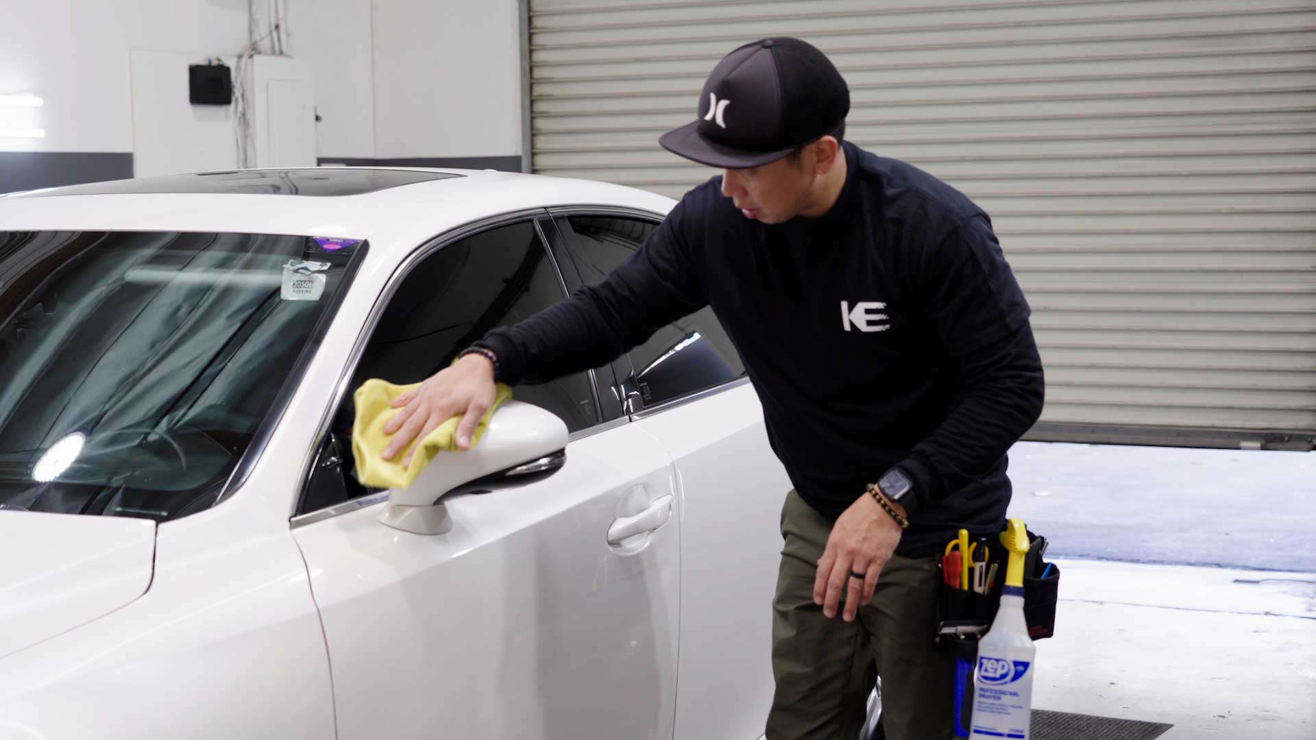 Skilled Car Window Tinting being cleaned after tinting in Moline