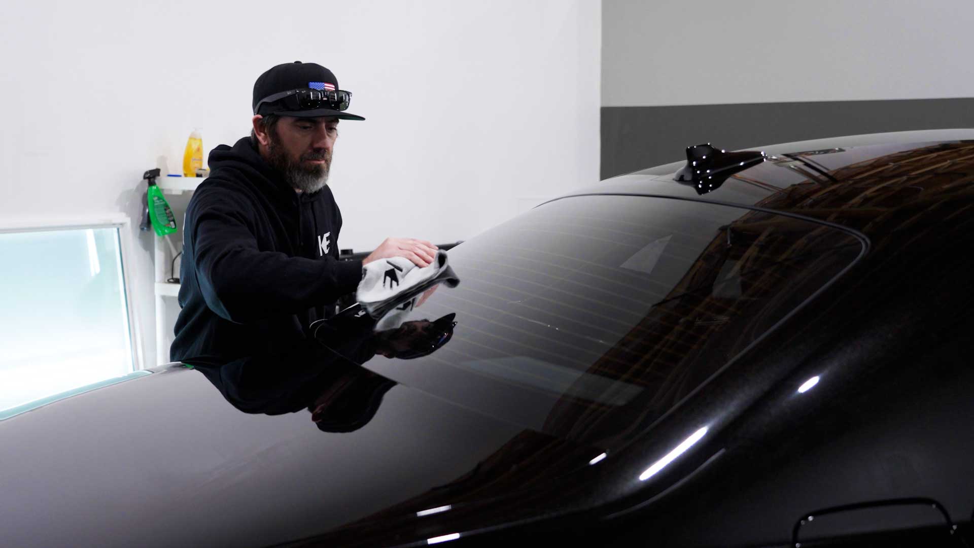 Skilled Car Window Tint being cleaned after tinting in Livingston