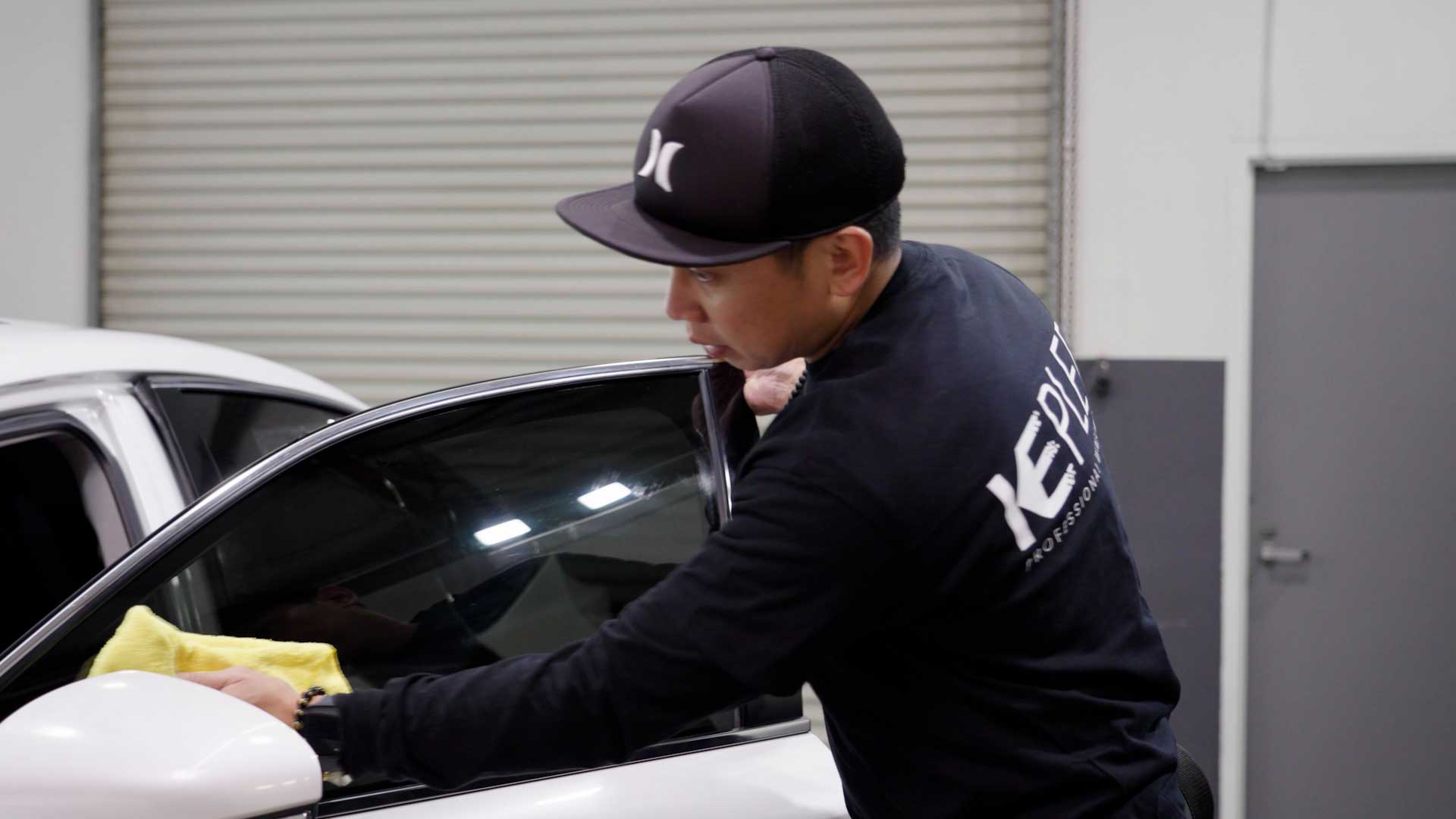 Expert Automotive Window Tint being cleaned after tinting in Plainsboro