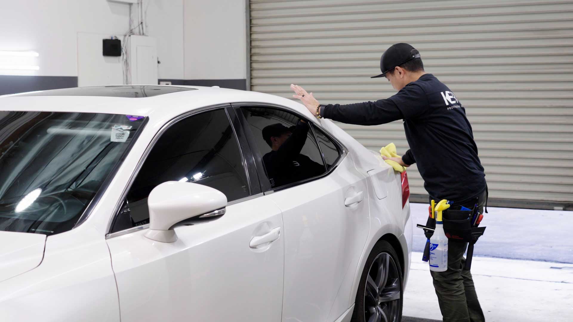 Skilled Car Window Tinting being cleaned after tinting in Durango