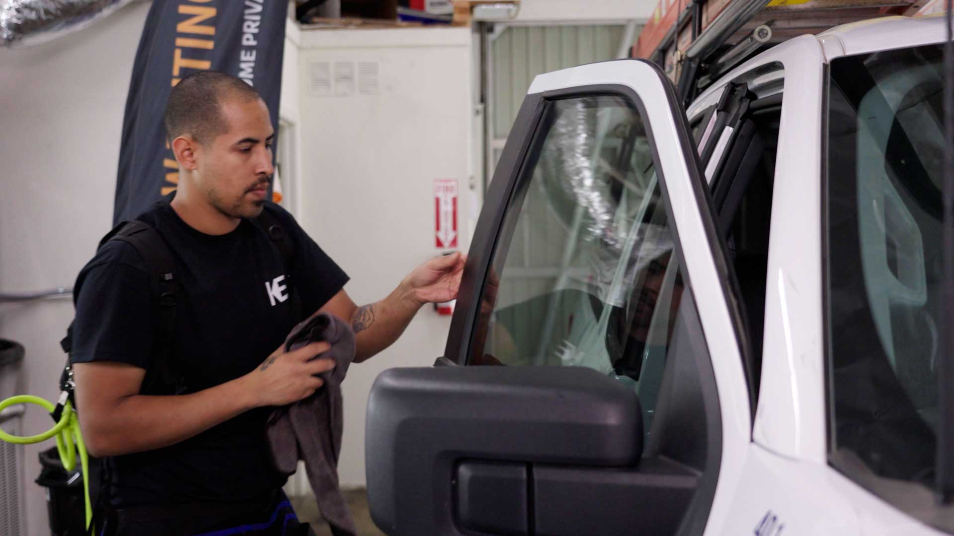 Expert Vehicle Window Tint being cleaned after tinting in Marietta