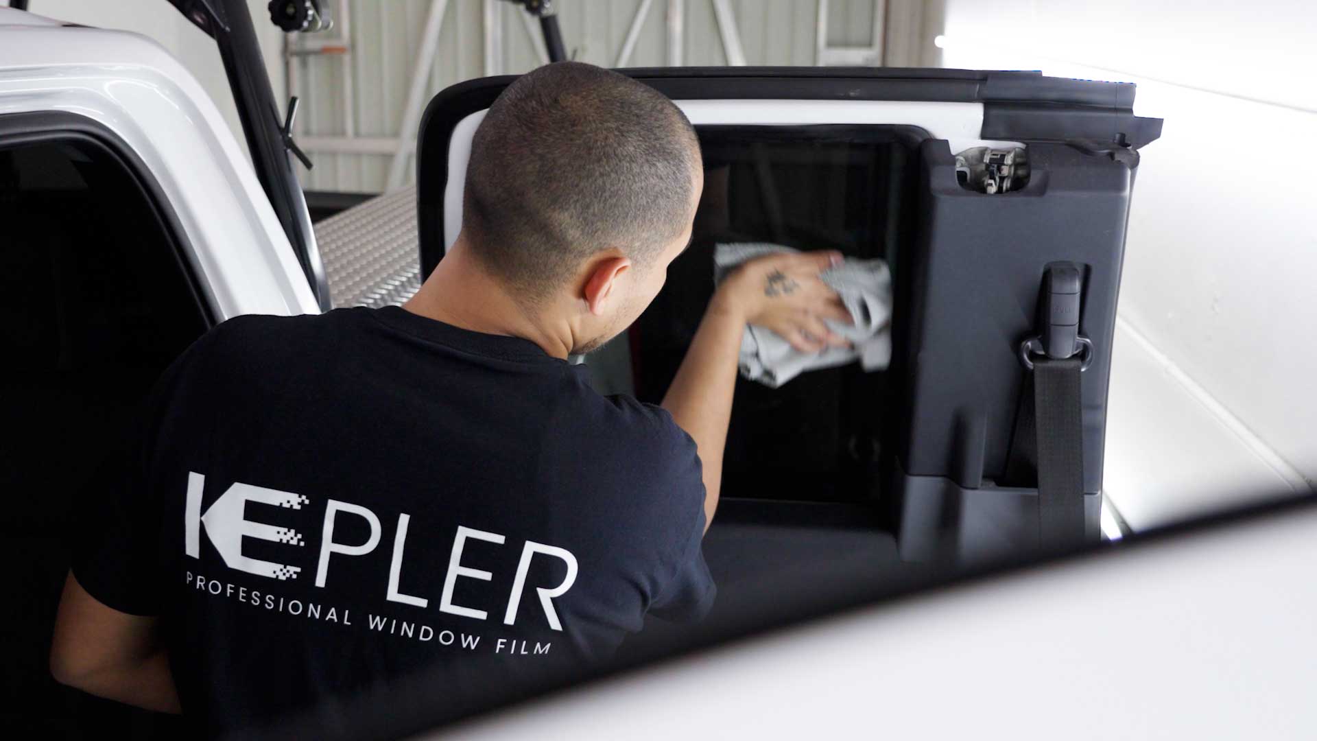 Skilled Car Glass Tint being cleaned after tinting in Burbank