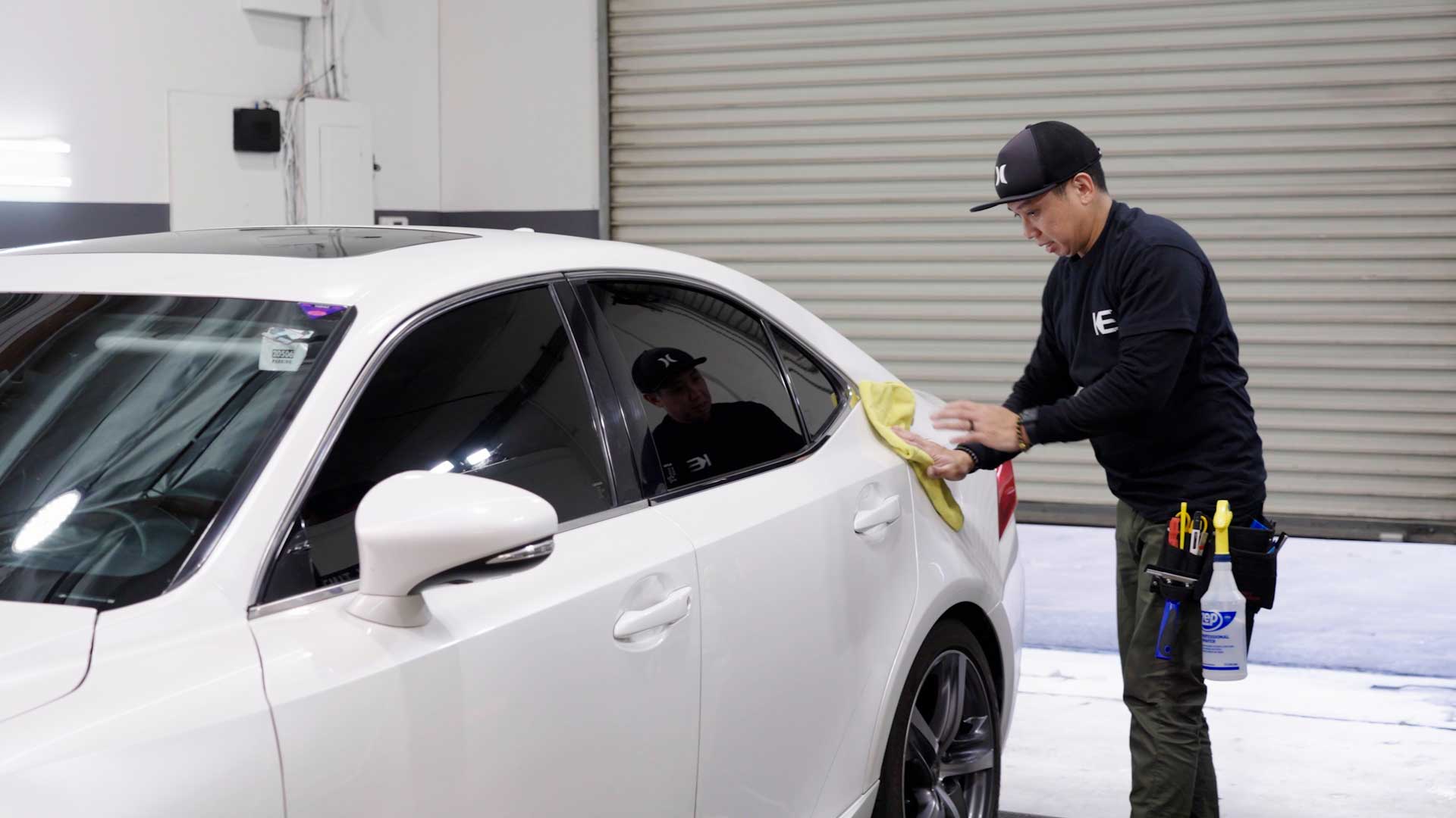 Professional Car Window Tinting being cleaned after tinting in Adelanto