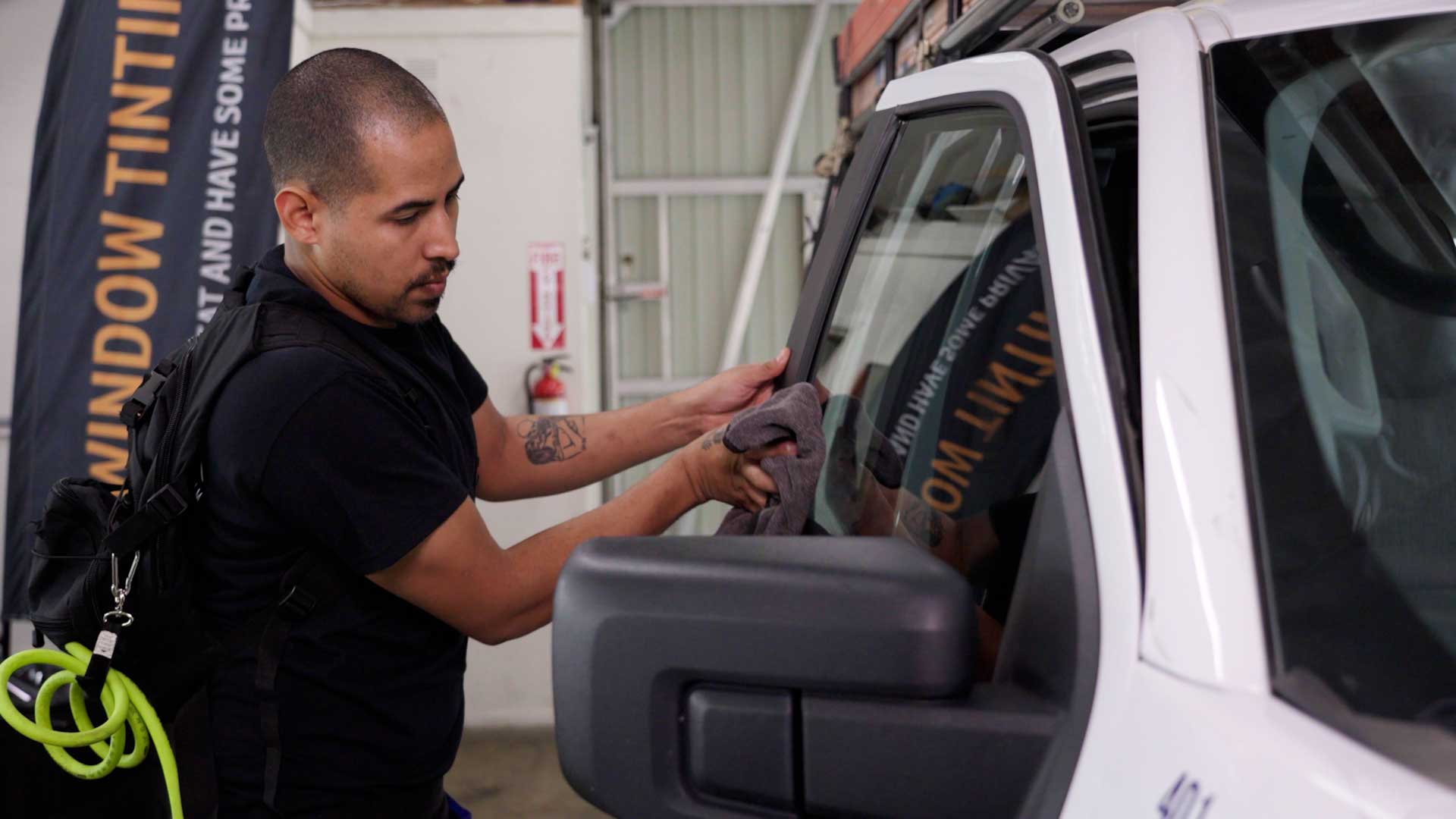 Professional Vehicle Window Tinting being cleaned after tinting in Millbrook