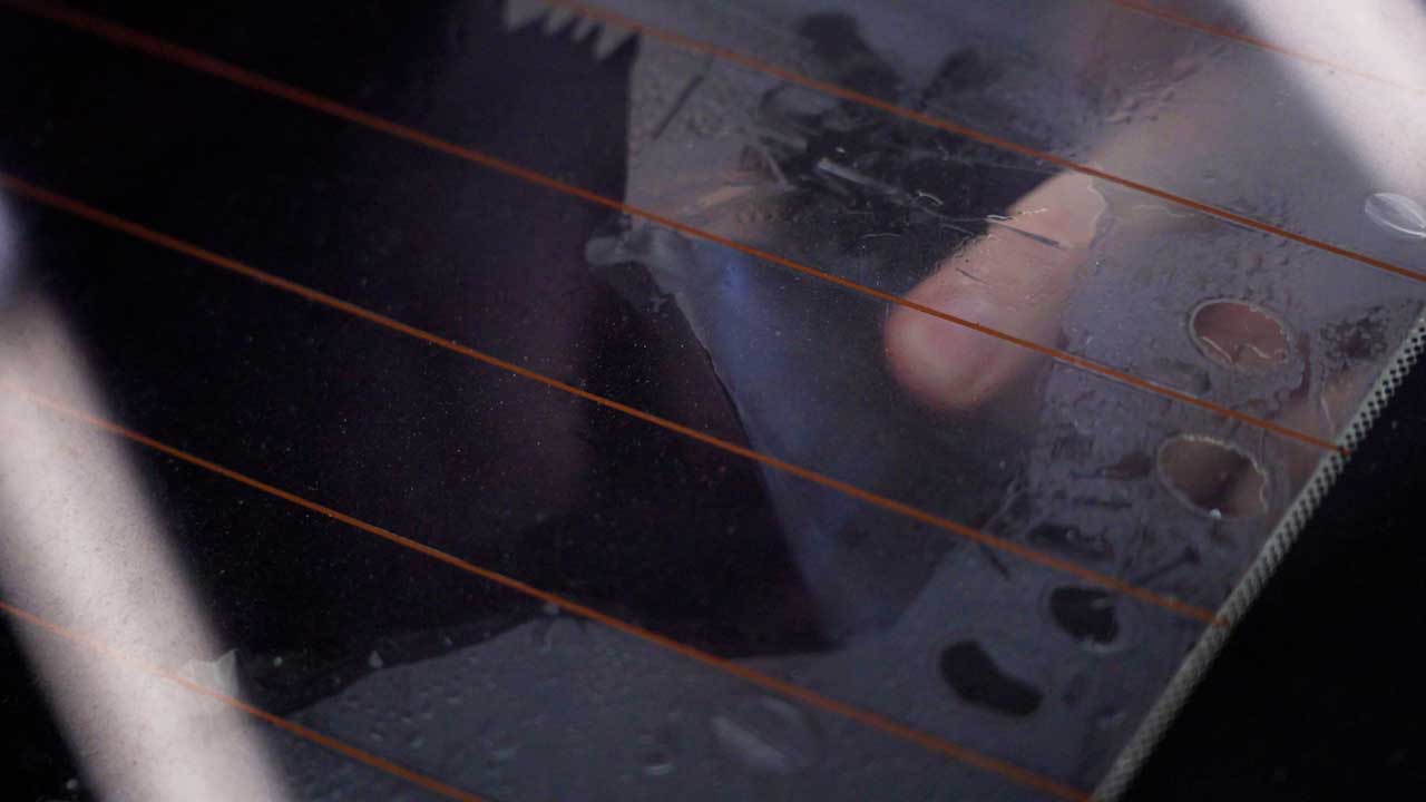 Expert Automotive Glass Tint Removal in Lawrence