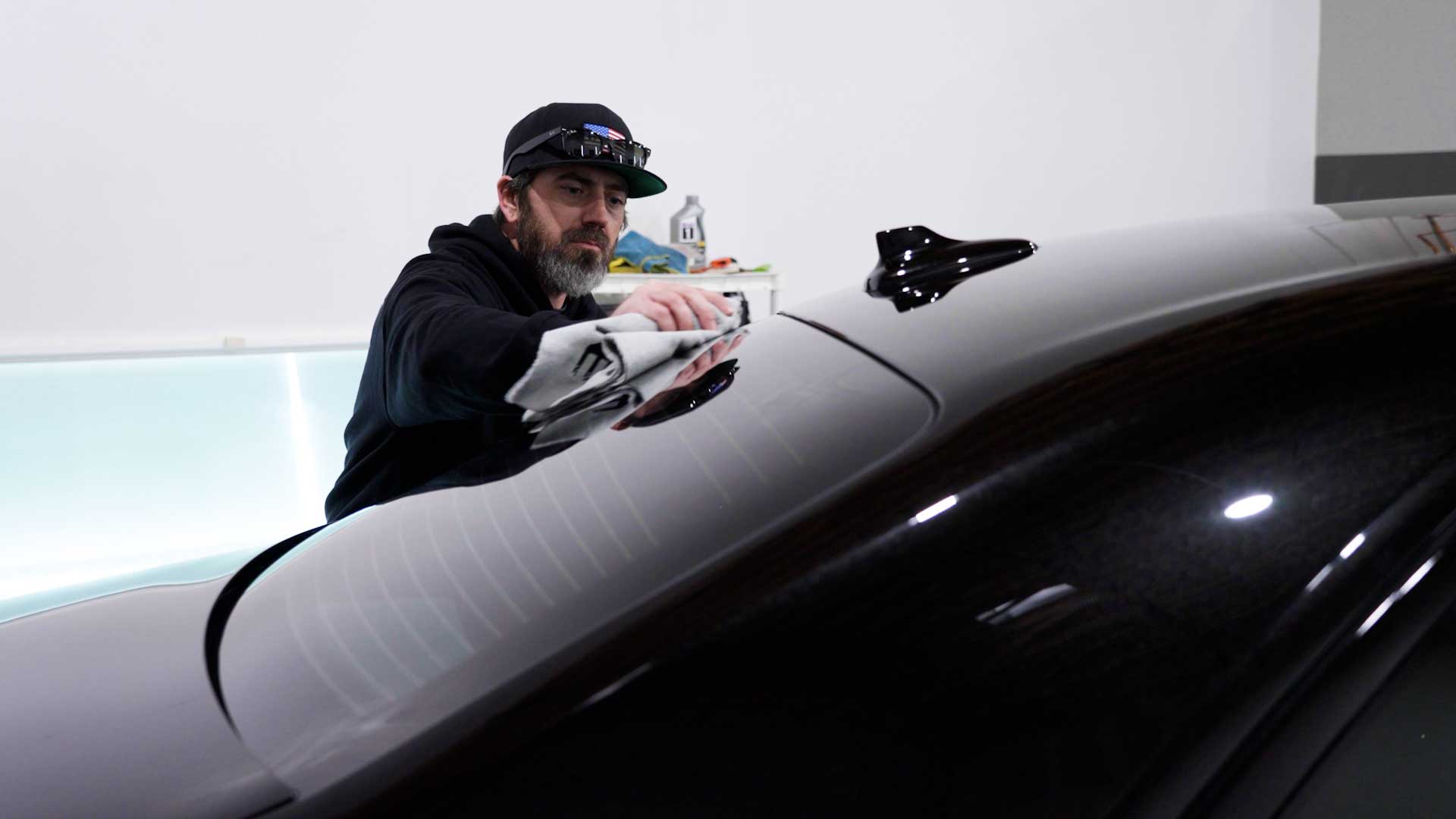 Professional Car Glass Tint being cleaned after tinting in Overland Park