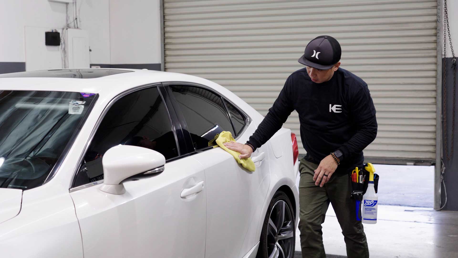 Professional Automotive Window Tint being cleaned after tinting in Chalmette