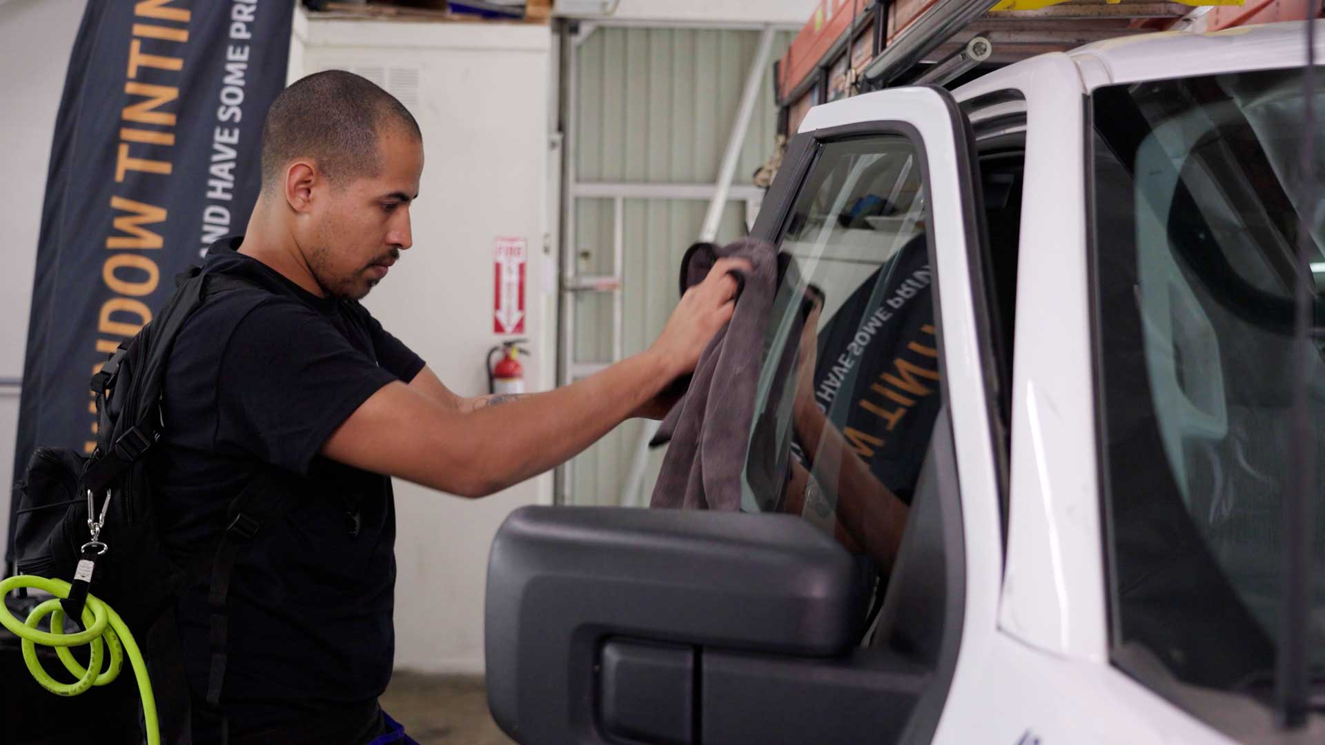 Expert Vehicle Glass Tinting being cleaned after tinting in McKinney