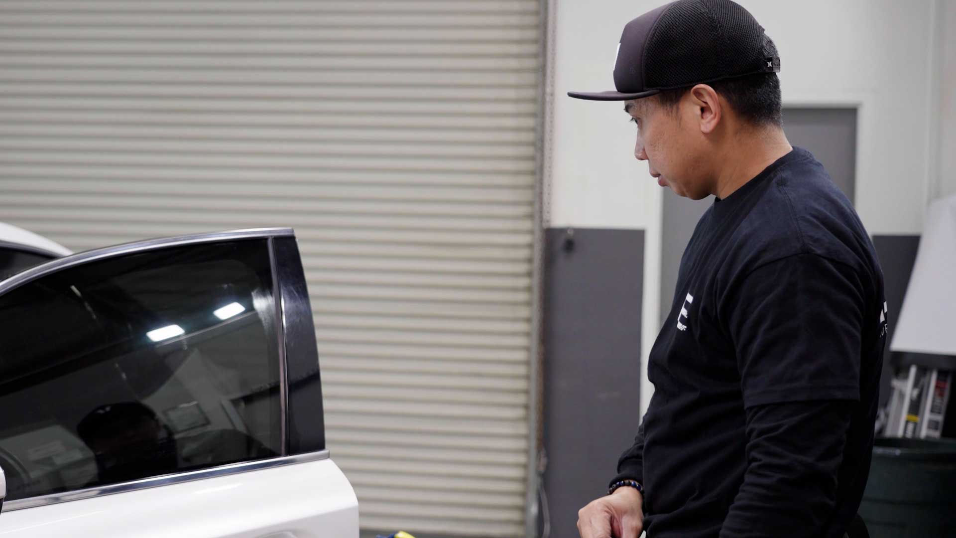 Skilled Car Window Tinting being cleaned after tinting in Federal Way