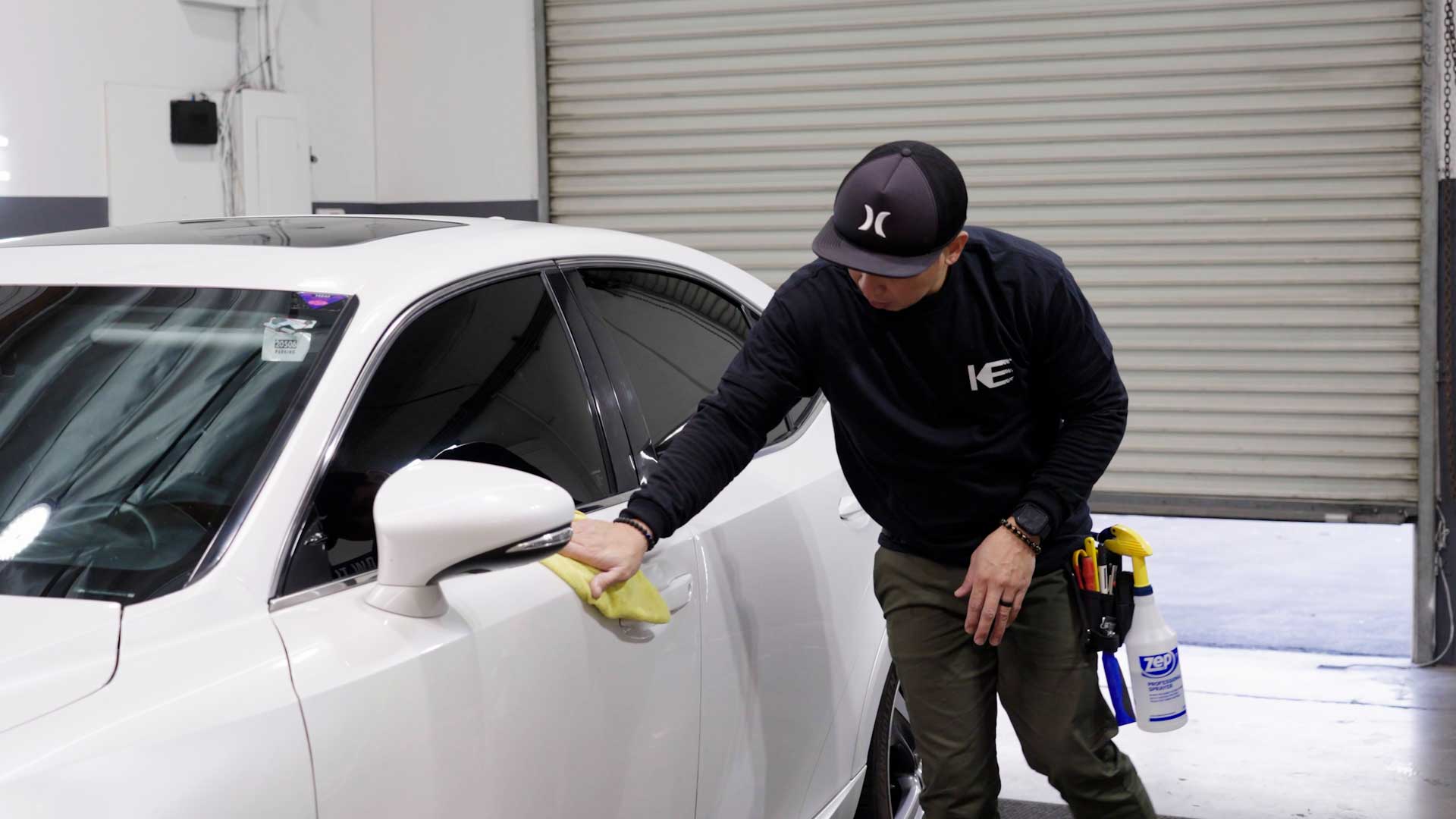 Expert Automotive Window Tint being cleaned after tinting in Visalia