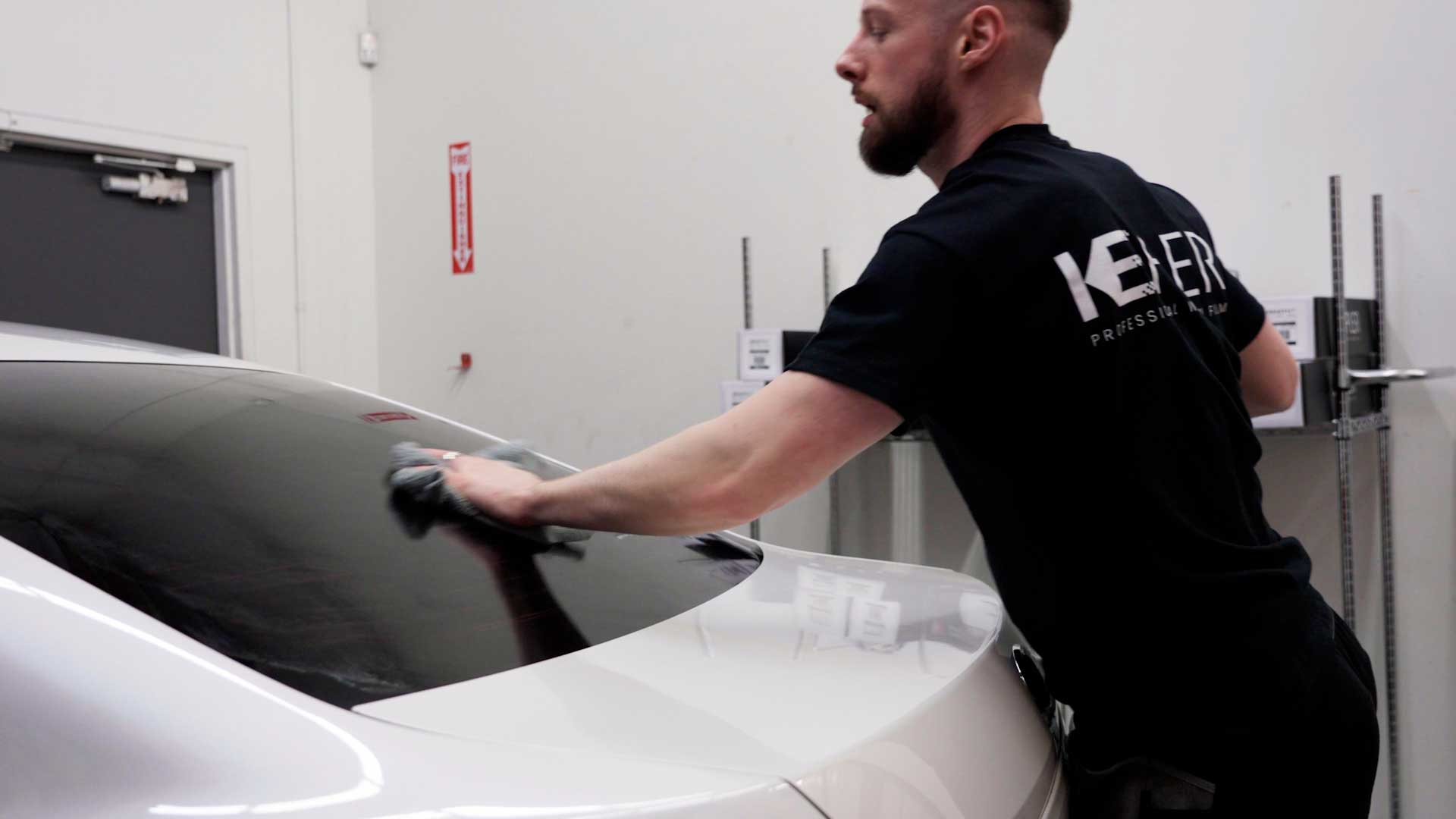 Skilled Vehicle Window Tint being cleaned after tinting in Wailuku