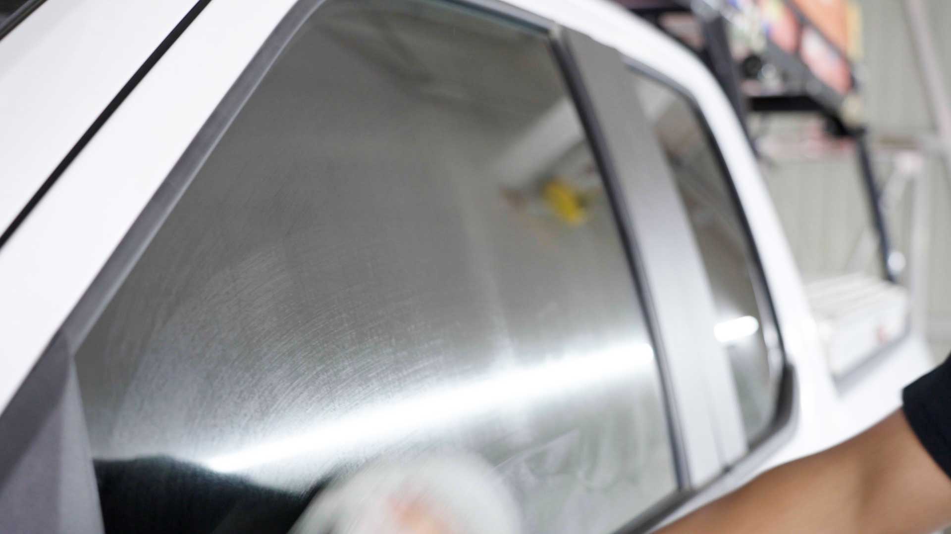 Professional Car Glass Tinting being cleaned after tinting in Kirkland
