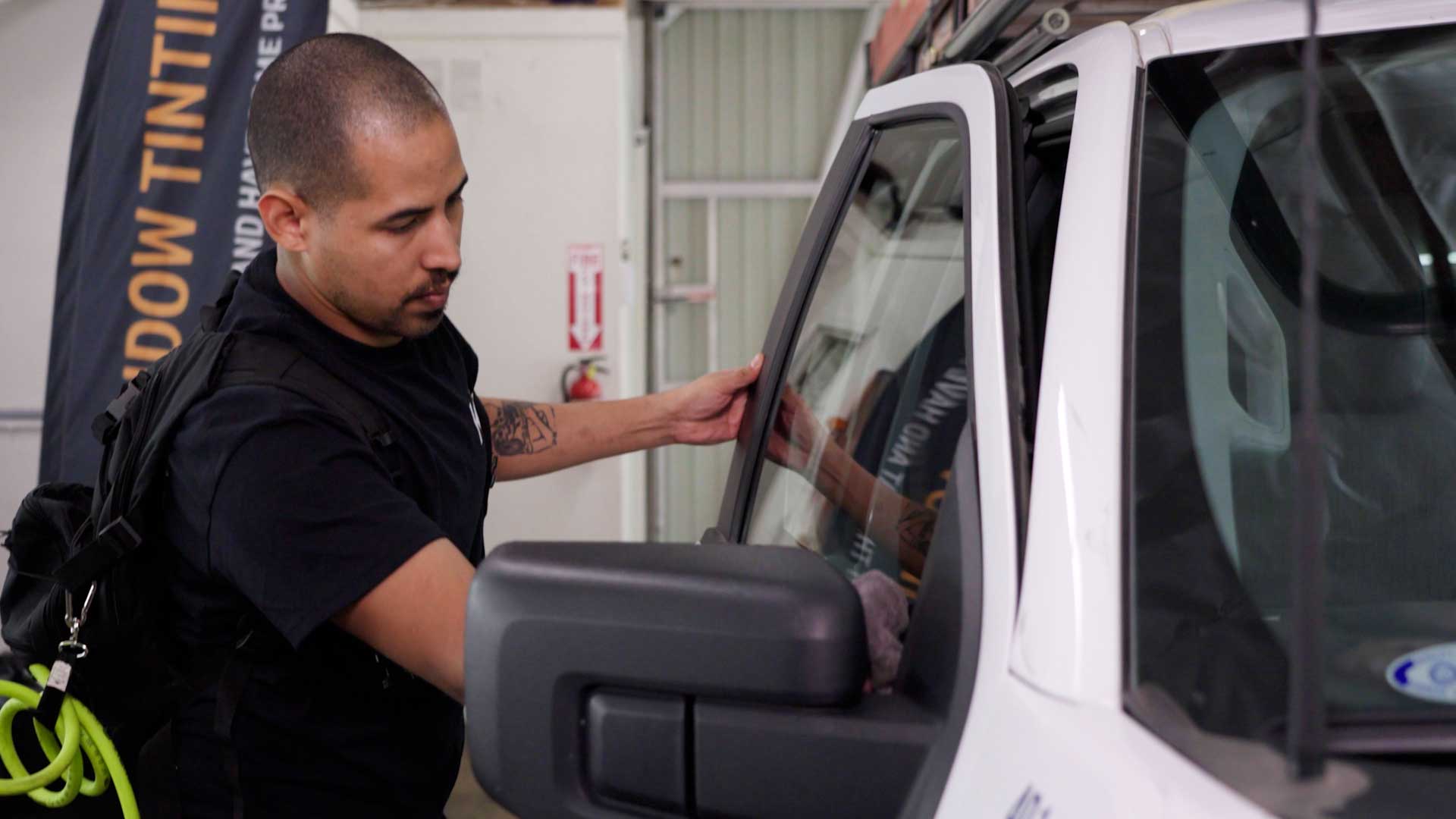 Professional Vehicle Glass Tinting being cleaned after tinting in Thousand Oaks
