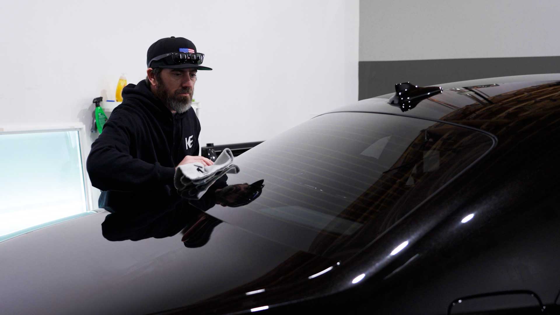 Skilled Automotive Window Tinting being cleaned after tinting in Turlock